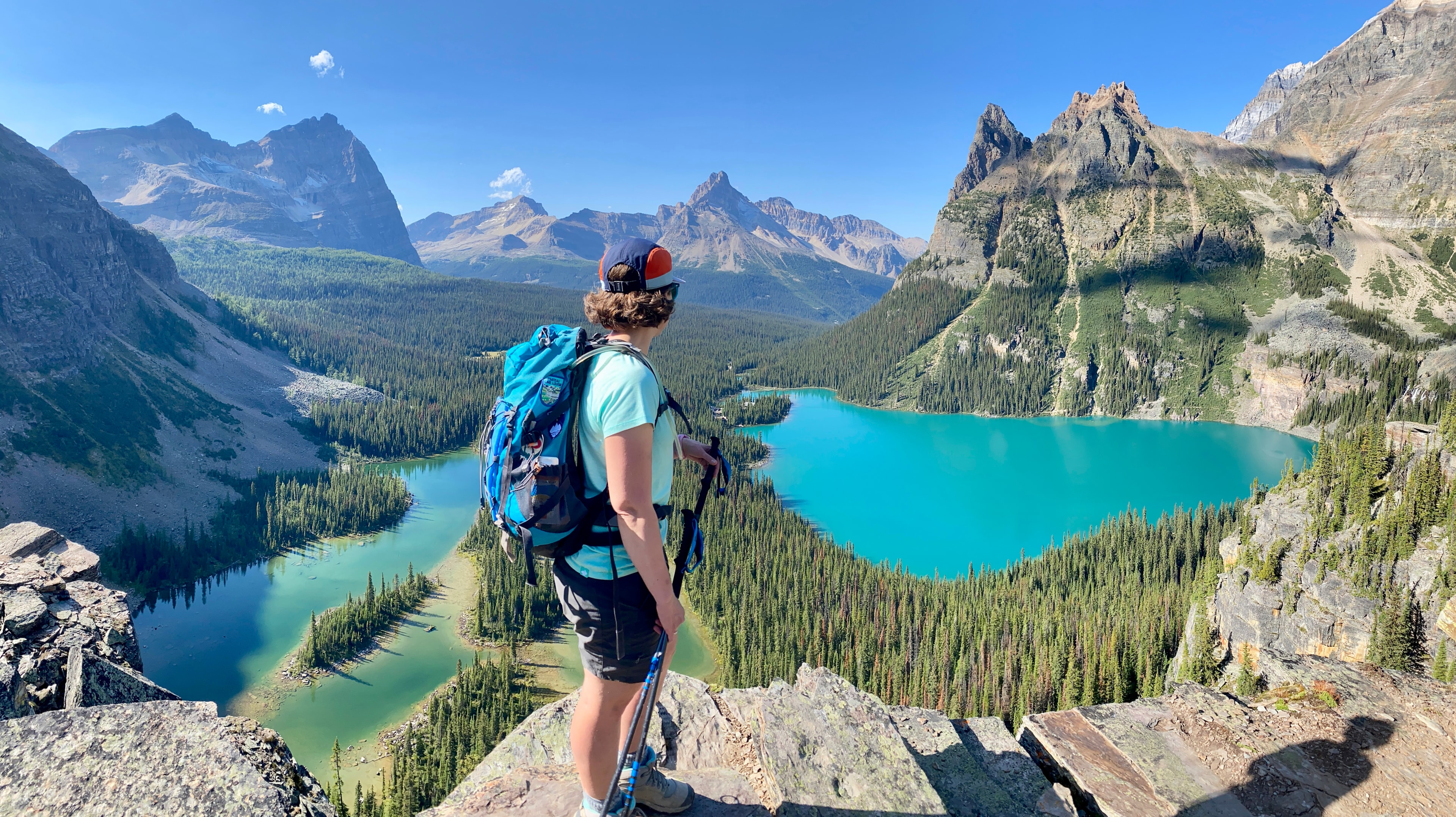 Hiker taking in the view of Lake O'Hara, Canadian Rockies